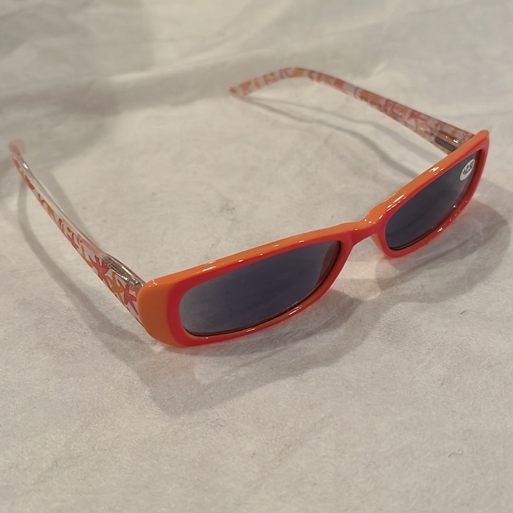 Sunglasses, readers 2.50